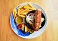 Blur Delicious salmon fish roasted steak in blue plate. with fresh vegetable Salad. grilled steak Royalty Free Stock Photo