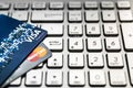 Bangkok, Thailand - August 24, 2017: Close up shot of 2 credit cards VISA and Mastercard on laptop computer with enter button focu Royalty Free Stock Photo