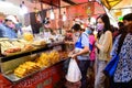 Bangkok, Thailand - August 14, 2020 : Crowd of people wear surgical mask walking to buy food at Wang Lang Market Royalty Free Stock Photo
