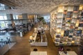 Bangkok, Thailand - August 7, 2020: modern and minimal interior design bookstore where is decorated by warm lights and bookshelf