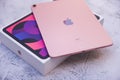 Bangkok, Thailand - August 21, 2021: New Apple iPad rose gold color, camera and rear view logo Apple launch Tablet iPad Air 2020-