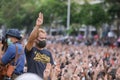 Protesters a three finger salute to show symbolic gestures.