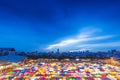 BANGKOK - Thailand, August 08, 2017 : Talad Rod Fai or Train Market. Mmulti-colored tents with beautiful sky after sunset over