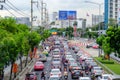 Traffic moves slowly along a busy road in Bangkok, Thailand Royalty Free Stock Photo