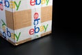 Brown paper box eBay packaging delivered with security scotch tape to safe and protect for international shipping program. Royalty Free Stock Photo