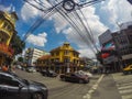 Bangkok, Thailand - november 15, 2016: busy rush hour city street with lots of signs and banners in the background, chinatown, tuk Royalty Free Stock Photo