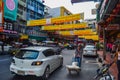Bangkok, Thailand - november 15, 2016: busy rush hour city street with lots of signs and banners in the background, chinatown, tuk