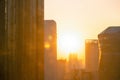 Bangkok cityscape with intricate modern buildings in beautiful golden winter sunrise sky and PM 2.5 pollution