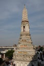 Beautifully painted white tower of the Buddhist temple Wat Arun in Bangkok