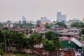 Beggarly shacks of the Asian metropolis. Slums of the capital of Thailand. City landscape