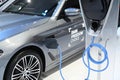 Bangkok, Thailand - December 3, 2018 : Electric charge of BMW 5 Series hybrid car showcased at Bangkok Motor Expo 2018