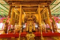 Bangkok, Thailand - December, 20, 2021 : Golden Wood Statue of Guan Yin with 1000 hands At Leng Noei Yi 2 or Mangkon Temple in Royalty Free Stock Photo