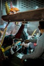 BANGKOK, THAILAND -  December 2019: Man in Tuc Tuc Royalty Free Stock Photo