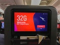 Bangkok / Thailand - December 10 2019: passenger screen on seat with welcome on board message