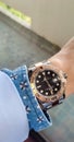 Rolex Yacht-Master with rose gold bezel and two tone rolesor strap on wrist