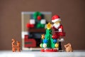 Bangkok, Thailand. December 14,2016 - Santa Claus Lego minifigure preparing christmas tree decorations. Studio shot