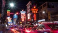 BANGKOK-THAILAND - DECEMBER 30, 2017 : Street in Chinatown and neon light signs and cars on Yaowarat road at night in a large Royalty Free Stock Photo