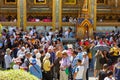 Bangkok, Thailand - December 02, 2019: Tourists visiting the Wat Phra Kaew, Temple of the Emerald Buddha, and Grand Palace complex Royalty Free Stock Photo