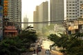 Bangkok, THAILAND - December 15, 2018: Vintage toned sunset over skyscrapers, low angle view of skyscrapers in city of THAILAND