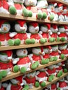 Cute dolls/toys on orderly store shelvesgift shop background