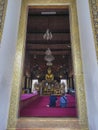 Golden Buddha statue in the Phra Ubosot of Wat Saket