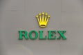 Light sign of Rolex watch logo in front of a store in Pathumwan, Bangkok. Rolex brand founded by Alfred Davis and Hans Wilsdorf. Royalty Free Stock Photo