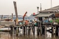 Old wooden local houses along the Chao Phraya riverside Royalty Free Stock Photo