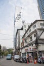 Street view of Silom area in Bangkok with King Power MahaNakhon in background