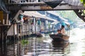 Bangkok, Thailand - Feb 11, 2018: Tourists enjoy traveling by tourist long-tail boat on Lad Mayom canal. Royalty Free Stock Photo