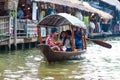 Bangkok, Thailand - Feb 11, 2018: Tourists enjoy traveling by tourist row boat on Lad Mayom canal. Royalty Free Stock Photo