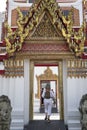 Tourists visit to Wat Phra Chetuphon Vimolmangkalaram Temple in Bangkok