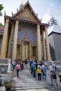 Tourists visit to Wat Phra Kaew or the Temple of the Emerald Buddha inside Grand Palace, Bangkok Royalty Free Stock Photo