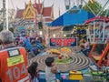 Unacquainted People with retro childplay racing carin Temple fair of Wat intharam at Bangkok city Thialand