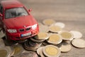 BANGKOK, THAILAND - FEBRUARY 18, 2022, Car on coins background Car loan, Finance, saving money, insurance and leasing time