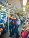 Bangkok, Thailand - February 28, 2017: Crowd of passengers on BTS Skytrain Silom line Royalty Free Stock Photo