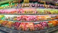 BANGKOK, THAILAND - FEBRUARY 10:Foodland supermarket displays various species of refrigerated apples and other fruits for sale in