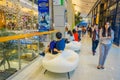 BANGKOK, THAILAND, FEBRUARY 02, 2018: Indoor view of unidentified people walking inside of Siam Paragon shopping mall in