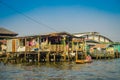 BANGKOK, THAILAND, FEBRUARY 08, 2018: Outdoor view of unidentified man in a boat, floating market in Thailand Royalty Free Stock Photo