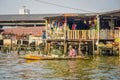 BANGKOK, THAILAND, FEBRUARY 08, 2018: Outdoor view of unidentified man in a boat, floating market in Thailand Royalty Free Stock Photo