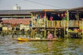 BANGKOK, THAILAND, FEBRUARY 08, 2018: Outdoor view of unidentified man in a boat, floating market in Thailand Royalty Free Stock Photo
