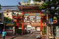 BANGKOK, THAILAND February 14, 2019: Traditional Chinese style temple, view from the street with asian passersby