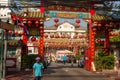 BANGKOK, THAILAND February 14, 2019: Traditional Chinese style temple, view from the street with asian passersby