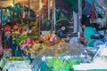 Interior of the market of flowers and fruits. Professions of local people.