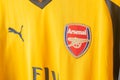 Bangkok, Thailand - Jan 18, 2022 : Arsenal logo on Arsenal retro shirt away jersey season 2016-2017 Royalty Free Stock Photo