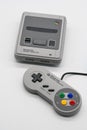 Super Famicom Mini, Vintage game console by Nintendo. Illustrative, editorial.