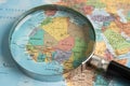 Bangkok, Thailand January 20, 2022 Africa, Magnifying glass close up with colorful world map, travel, geography, tourism and Royalty Free Stock Photo