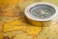 Bangkok, Thailand - January 20, 2022 Australia, Compass for navigation on vintage old antique world map background to travel, Royalty Free Stock Photo