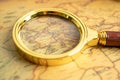 Bangkok, Thailand January 20, 2022 Australia, Magnifying glass close up with vintage old antique world map, travel, geography,