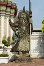 Chinese guardian stone statue in Wat Pho Temple in Bangkok Thail