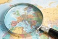 Bangkok, Thailand January 20, 2022 Europe, Magnifying glass close up with colorful world map, travel, geography, tourism and Royalty Free Stock Photo